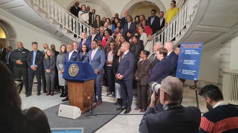 Ceo of Molaprise Addressing Audience at Mayor Adams Press Conference